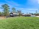 Property with house, RV, and large grassy area at 22287 Sw Mango Ln, Dunnellon, FL 34431