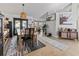 Dining room with wooden table and chairs at 22287 Sw Mango Ln, Dunnellon, FL 34431