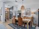 Dining room with wooden table and chairs at 22287 Sw Mango Ln, Dunnellon, FL 34431