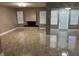 Bright living room with tile floors and access to patio at 23104 Sandalwood Dr # 104, Wildwood, FL 34785