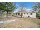 Exterior view of the back of house with a carport and an AC unit at 2501 Nw 20Th St, Ocala, FL 34475