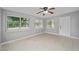 Open living area with tile flooring, windows, and a view of the yard creating an inviting space at 2501 Nw 20Th St, Ocala, FL 34475