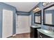 Bathroom with double vanity, glass sinks and a shower/tub combo at 3 Locust Trak, Ocala, FL 34472