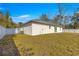 Large backyard with a new white privacy fence at 3690 Se 133Rd Pl, Belleview, FL 34420