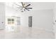 Bright and airy living room with high ceilings and tile flooring at 3690 Se 133Rd Pl, Belleview, FL 34420