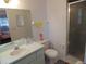 Clean bathroom with shower, toilet, and a single sink vanity at 4172 Ne 35Th Avenue Rd, Ocala, FL 34479