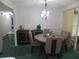 Dining room with round table and seating for four, plus a buffet at 4172 Ne 35Th Avenue Rd, Ocala, FL 34479