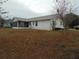 Back of house with screened porch at 4172 Ne 35Th Avenue Rd, Ocala, FL 34479