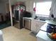 Kitchen boasts stainless steel refrigerator and dishwasher at 4172 Ne 35Th Avenue Rd, Ocala, FL 34479