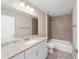 Bathroom with tile shower and granite countertop at 46 Pine Circle Run, Ocala, FL 34472