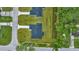 Aerial view of two new homes with spacious lots and surrounding trees at 6088 Nw 57Th Ave, Ocala, FL 34482