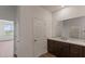 Bathroom with vanity, mirror, and linen closet at 6267 Sw 75Th Court Rd, Ocala, FL 34474