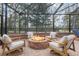 Relaxing outdoor fire pit area with seating at 7267 Se 12Th Cir, Ocala, FL 34480