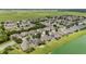 Aerial view of houses near a lake at 7646 Sw 100Th Ct, Ocala, FL 34481