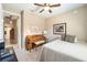 Spacious bedroom with a queen-size bed and a built-in piano at 7646 Sw 100Th Ct, Ocala, FL 34481