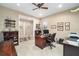 Home office with two workspaces and built-in shelving at 7646 Sw 100Th Ct, Ocala, FL 34481