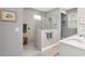 Elegant bathroom with a large walk-in shower and modern fixtures at 8749 Sw 93Rd Cir, Ocala, FL 34481