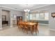 Bright dining room with a wooden table and chairs at 8749 Sw 93Rd Cir, Ocala, FL 34481