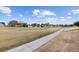 View of a golf course with homes in the background at 8749 Sw 93Rd Cir, Ocala, FL 34481