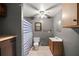 Small bathroom with shower, toilet, and vanity at 876 Ne 71St Ln, Ocala, FL 34479