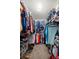 Large walk-in closet with ample shelving and hanging space at 876 Ne 71St Ln, Ocala, FL 34479