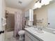 Clean bathroom with a tub, toilet and vanity at 8877 Sw 96Th St # B, Ocala, FL 34481