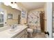 Bathroom with shower/tub combo and beach-themed decor at 8877 Sw 96Th St # B, Ocala, FL 34481