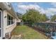 Small, fenced backyard with grassy area at 9051 Sw 96Th Ln # B, Ocala, FL 34481