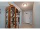 Bright entryway with tiled floors and a curio cabinet at 9051 Sw 96Th Ln # B, Ocala, FL 34481