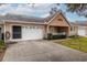 Well-maintained villa featuring a carport and updated exterior at 9051 Sw 96Th Ln # B, Ocala, FL 34481