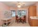 Breakfast nook with natural light, tile floors, and table with seating for two at 9051 Sw 96Th Ln # B, Ocala, FL 34481