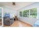Bright office with a work space, lots of natural light, and a comfortable chair at 9051 Sw 96Th Ln # B, Ocala, FL 34481