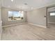 Bright dining room with chandelier and large window at 9253 Sw 86Th Pl, Ocala, FL 34481