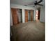 Bedroom with double closets and neutral carpeting at 9359 Bahia Rd, Ocala, FL 34472