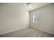 Well-lit bedroom featuring ceiling fan and window shutters at 9411 Sw 54Th St, Ocala, FL 34481