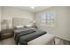 Bedroom with a queen bed and neutral decor at 9411 Sw 54Th St, Ocala, FL 34481