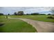 Golf course path with lush green grass at 9411 Sw 54Th St, Ocala, FL 34481