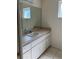 Bathroom with vanity and a large mirror at 9794 Sw 96Th St, Ocala, FL 34481