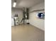 Garage with storage shelving and water heater at 9794 Sw 96Th St, Ocala, FL 34481