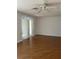 Living room with wood-look floors and sliding doors at 9794 Sw 96Th St, Ocala, FL 34481