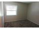 Bright bedroom with neutral walls and carpet flooring at 100 Sweetgum Woods Ct # 8C, Deltona, FL 32725