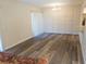 Dining room with vinyl flooring and wainscoting at 100 Sweetgum Woods Ct # 8C, Deltona, FL 32725