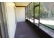 Private screened porch overlooking backyard at 100 Sweetgum Woods Ct # 8C, Deltona, FL 32725