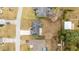 Aerial view of a single-Gathering house with a large backyard and driveway at 10628 Sw 74Th Ave, Ocala, FL 34476