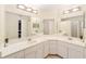 Double vanity bathroom with a corner sink and ample counter space at 10628 Sw 74Th Ave, Ocala, FL 34476