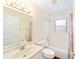 Clean bathroom with single vanity, tub and shower at 10628 Sw 74Th Ave, Ocala, FL 34476