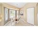 Cozy breakfast nook with wood table and chairs, near kitchen and window at 10628 Sw 74Th Ave, Ocala, FL 34476