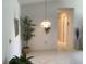 Dining room with light carpeting, a plant, and a stained-glass light fixture at 10829 Sw 83Rd Ave, Ocala, FL 34481