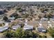 Aerial view showcasing a large community of single-Gathering homes at 11253 Sw 77Th Ct, Ocala, FL 34476