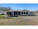 Expansive backyard view of home exterior at 11253 Sw 77Th Ct, Ocala, FL 34476